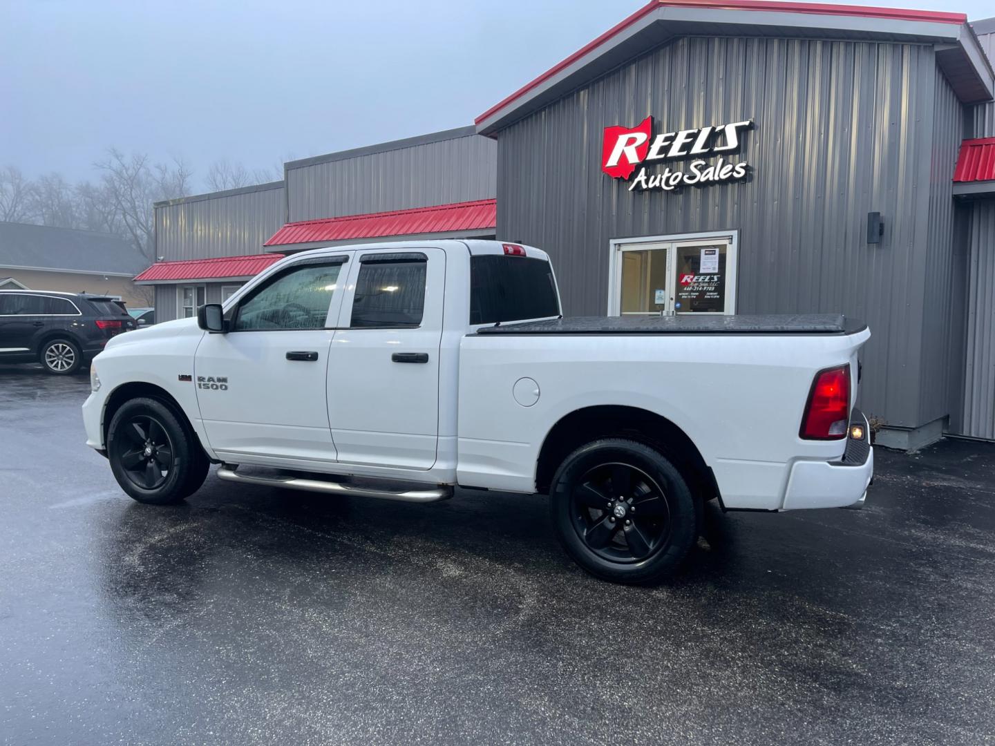 2014 White /Black RAM 1500 Express Quad Cab 4WD (1C6RR7FT5ES) with an 5.7L V8 OHV 16V engine, 8-Speed Automatic transmission, located at 11115 Chardon Rd. , Chardon, OH, 44024, (440) 214-9705, 41.580246, -81.241943 - Photo#14